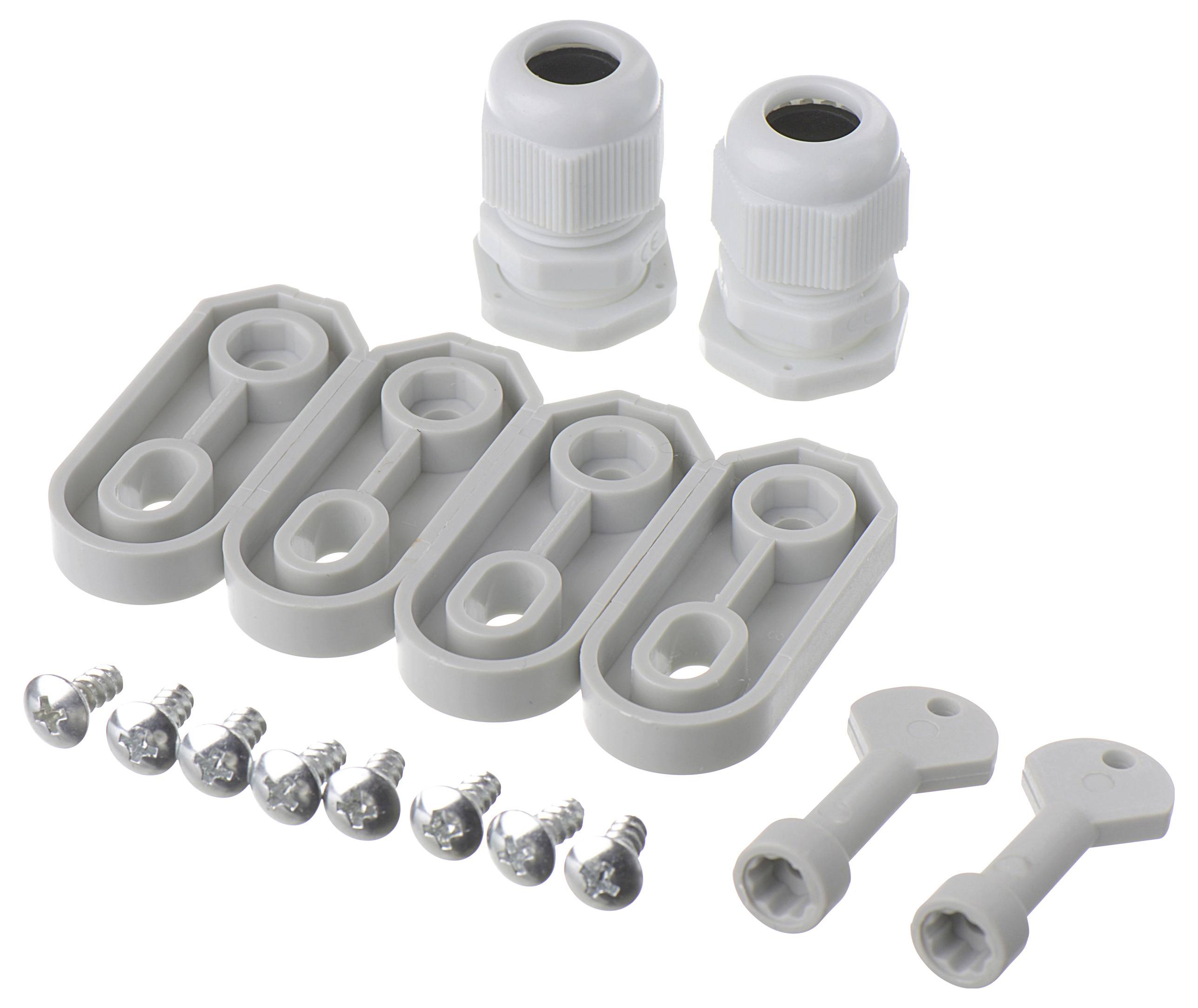Białe dławnice kablowe, szare uszczelki, śruby i plastikowy klucz na białym tle. Komponenty do instalacji elektrycznych.