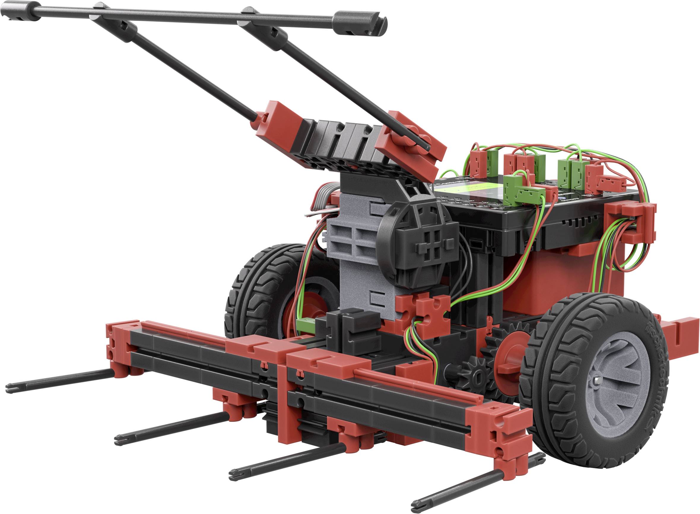 Pojazd robotyczny z czujnikami i kablami, zmontowany z czerwonych i czarnych elementów, zamontowany na kołach do przeprowadzania eksperymentów technicznych.