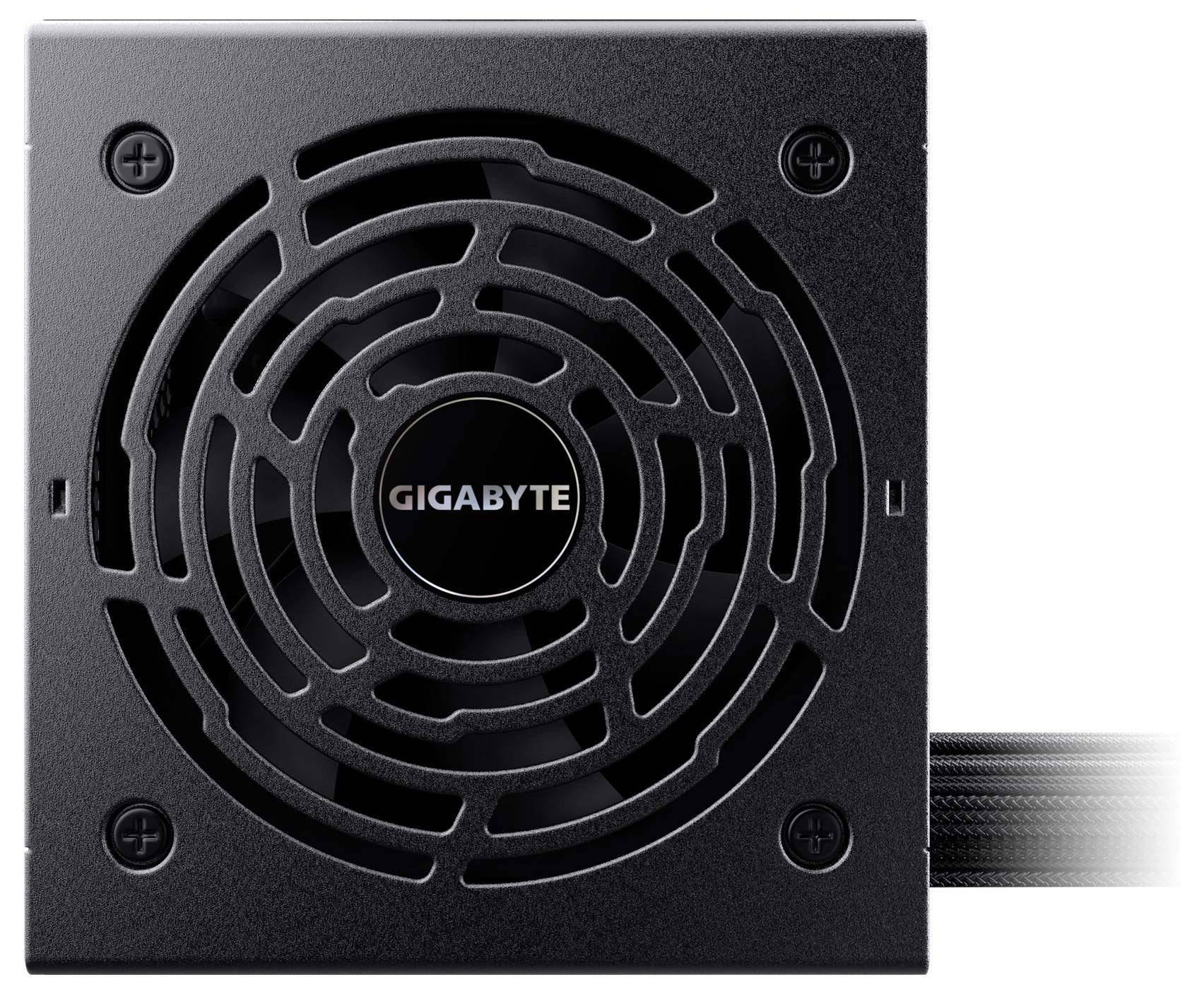 Zasilacz 'GIGABYTE' w czarnej obudowie z widoczną kratką wentylacyjną z perspektywy góry. Widoczne przewody z jednej strony.
