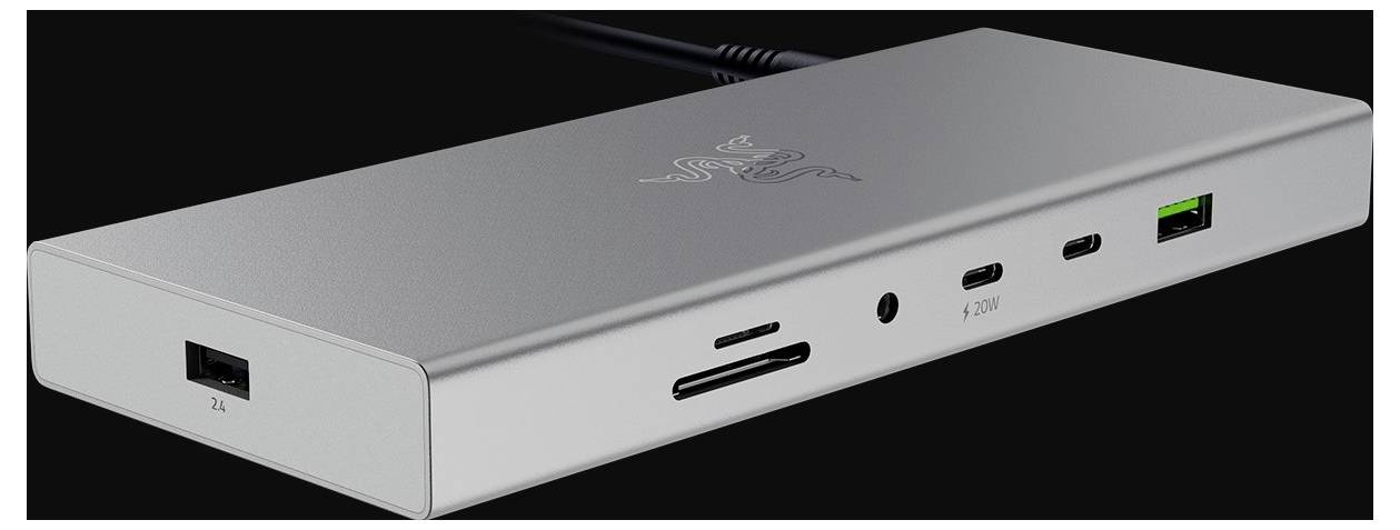 Srebrna stacja dokująca z wieloma portami: USB, HDMI i audio. Idealna do podłączania urządzeń w różnorodnych zastosowaniach.