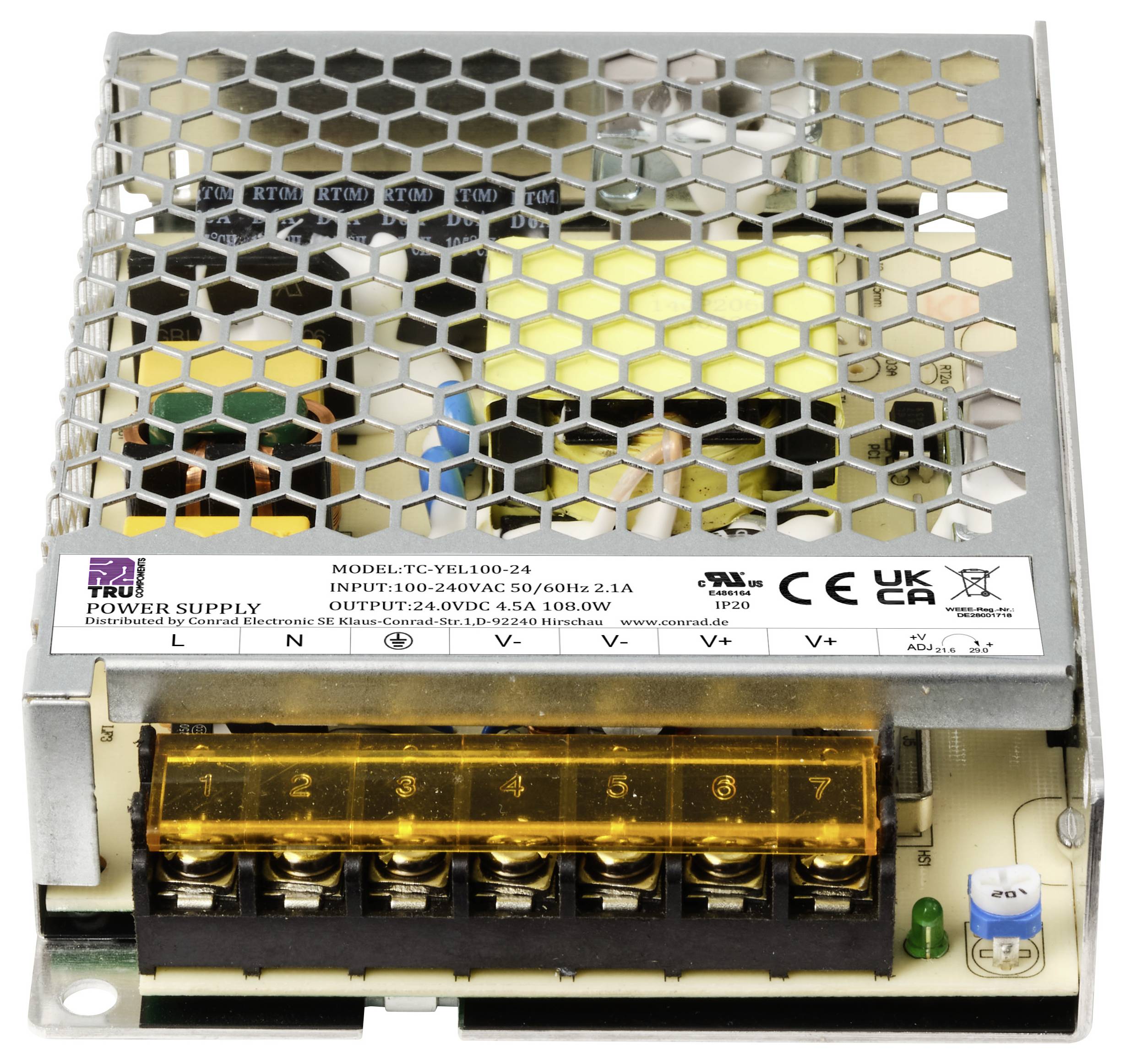 Jednostka zasilająca z metalową osłoną kratową, z napisem 'Power Supply'. Pokazuje złącza elektryczne i specyfikacje techniczne.