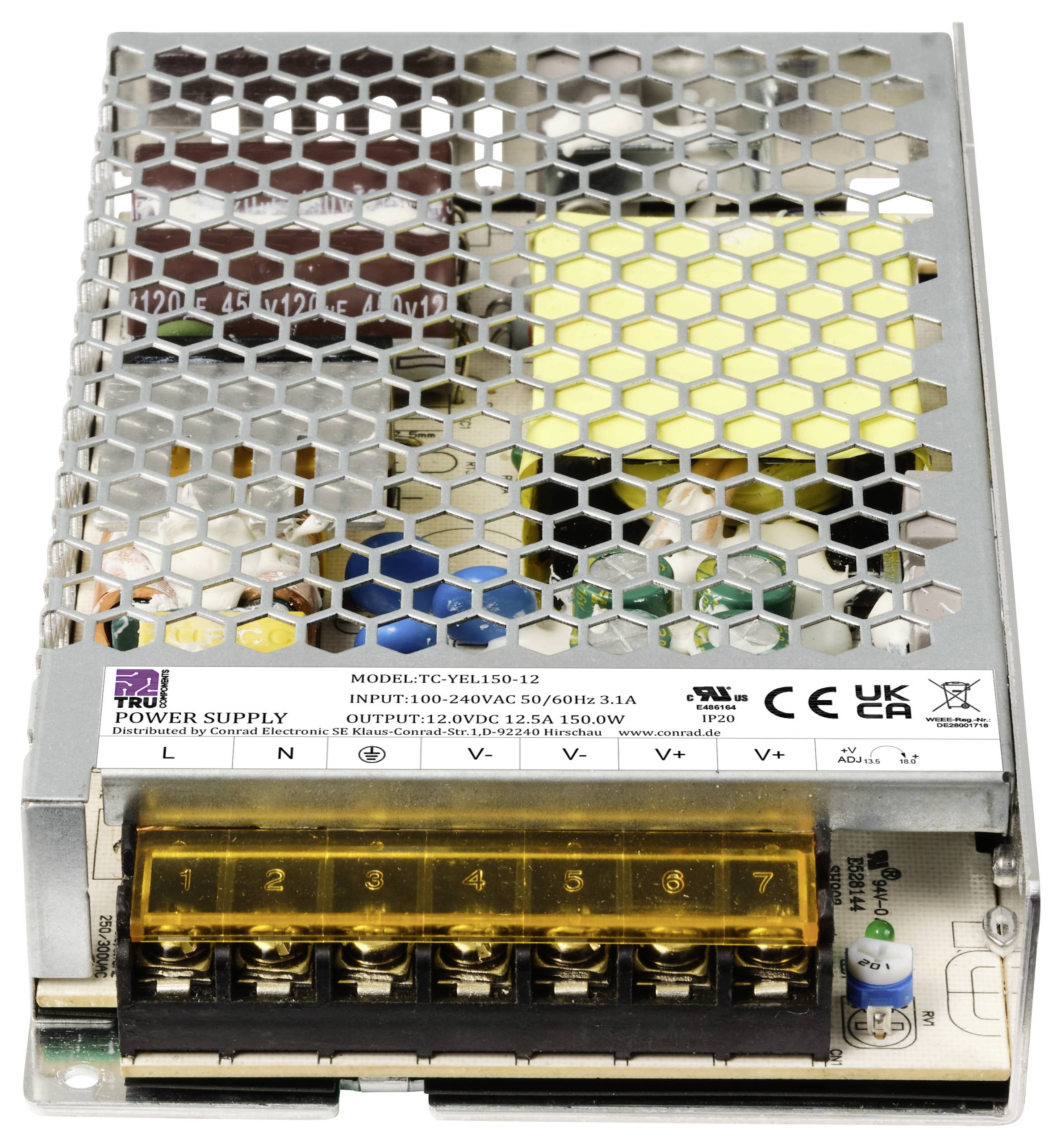 Metalowe zasilanie z sześcioma zaciskami przyłączeniowymi oraz oznaczeniami specyfikacji modelu, wejścia i wyjścia na etykiecie.