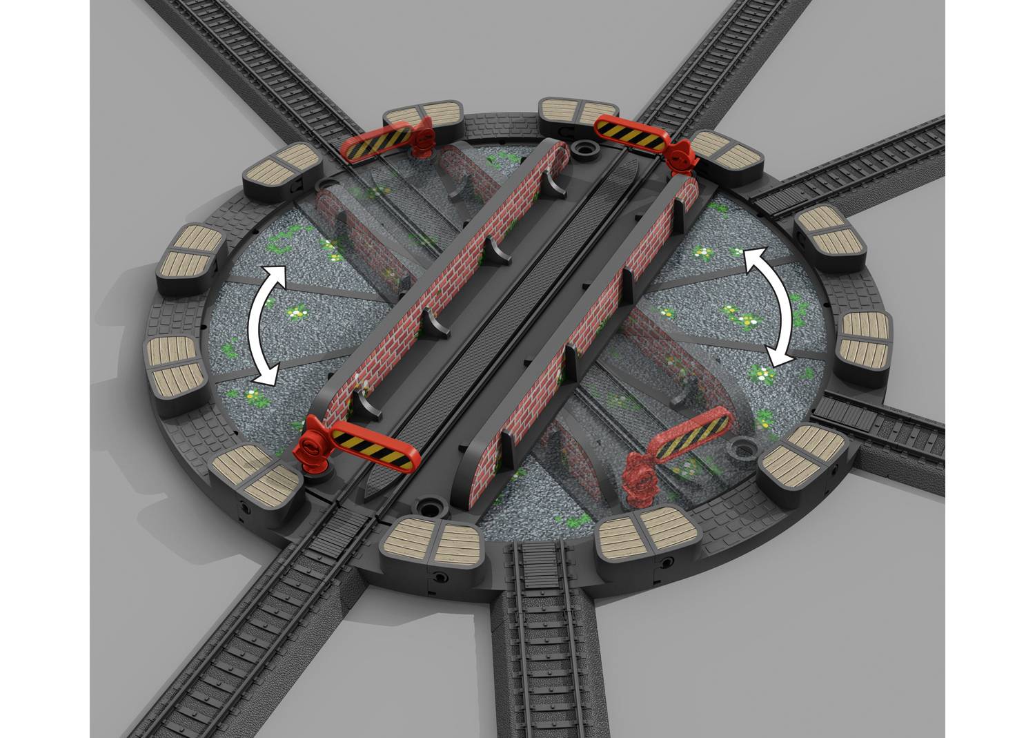 Model obrotownicy: Okrągłe urządzenie z szynami, czerwonymi barierami i sterującymi strzałkami. Służy do zmiany kierunku jazdy pociągów.