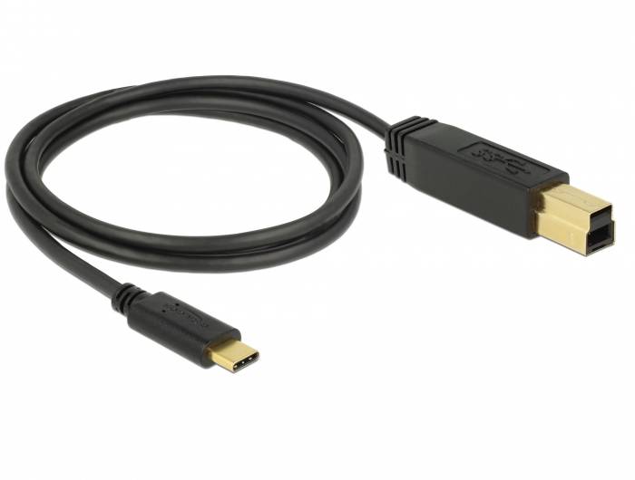 Kabel USB z wtyczkami Type C i Type B, przeznaczone do przesyłania danych i ładowania, wykonane w formie spiralnej.