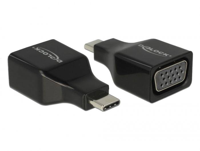 Dwa czarne adaptery z USB-C na VGA, leżące obok siebie. Jeden pokazuje stronę USB-C, drugi stronę VGA.