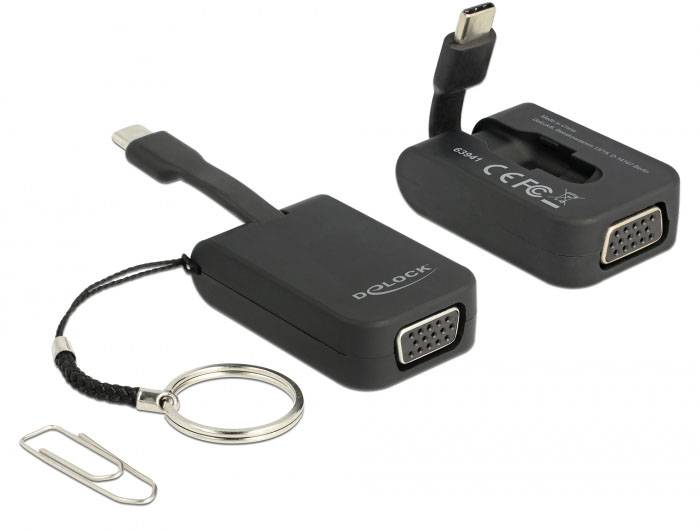 Dwa czarne adaptery od DeLock, oba z złączem USB-C na VGA. Jeden pokazuje tył z logo certyfikacyjnymi, drugi przednią stronę.