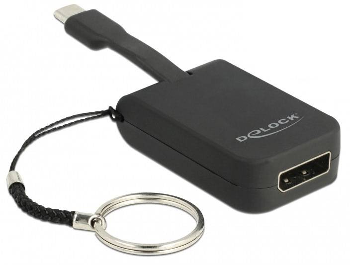 Czarny adapter Delock USB-C z kółkiem na klucze, umożliwia podłączenie urządzeń USB za pomocą wtyczki USB-C.