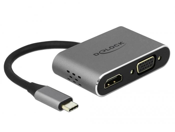 Adapter USB-C z wyjściami HDMI i VGA, przydatny do podłączania nowoczesnych urządzeń do starszych monitorów lub projektorów.