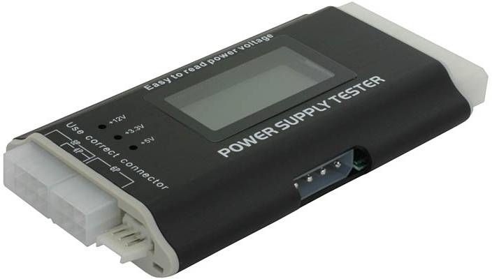 Czarny tester zasilacza z wyświetlaczem LCD, złączami i oznaczeniami do pomiaru napięcia. Tekst: 'POWER SUPPLY TESTER'.