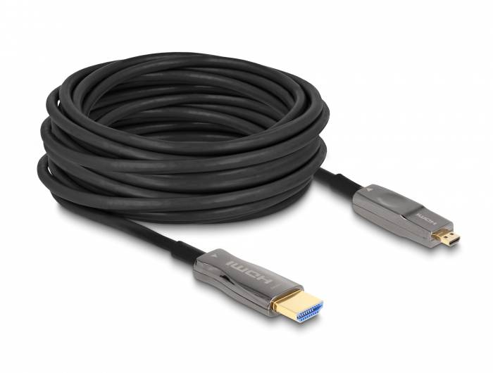 Czarny kabel HDMI, z wtyczką HDMI po lewej stronie i wtyczką Micro-HDMI po prawej stronie. Owinięty, gotowy do podłączenia urządzeń.