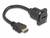 Czarny kabel HDMI z wtyczką męską po lewej stronie oraz gniazdem żeńskim, nadającym się do zamocowania na powierzchni.