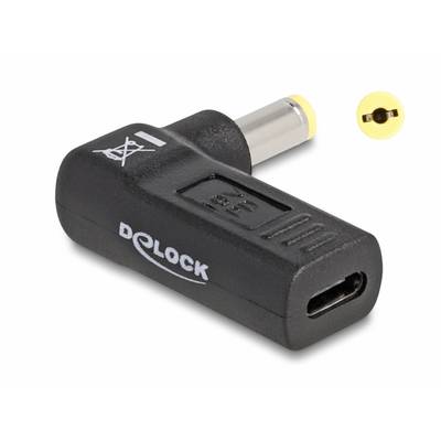 Czarny adapter Delock z USB-C na żółty wtyk cylindryczny, często stosowany do podłączania urządzeń.