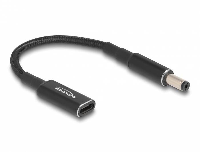 Czarny kabel adapter z gniazdem USB-C i okrągłą wtyczką na przeciwnym końcu. Odpowiedni do zasilania lub przesyłania danych.