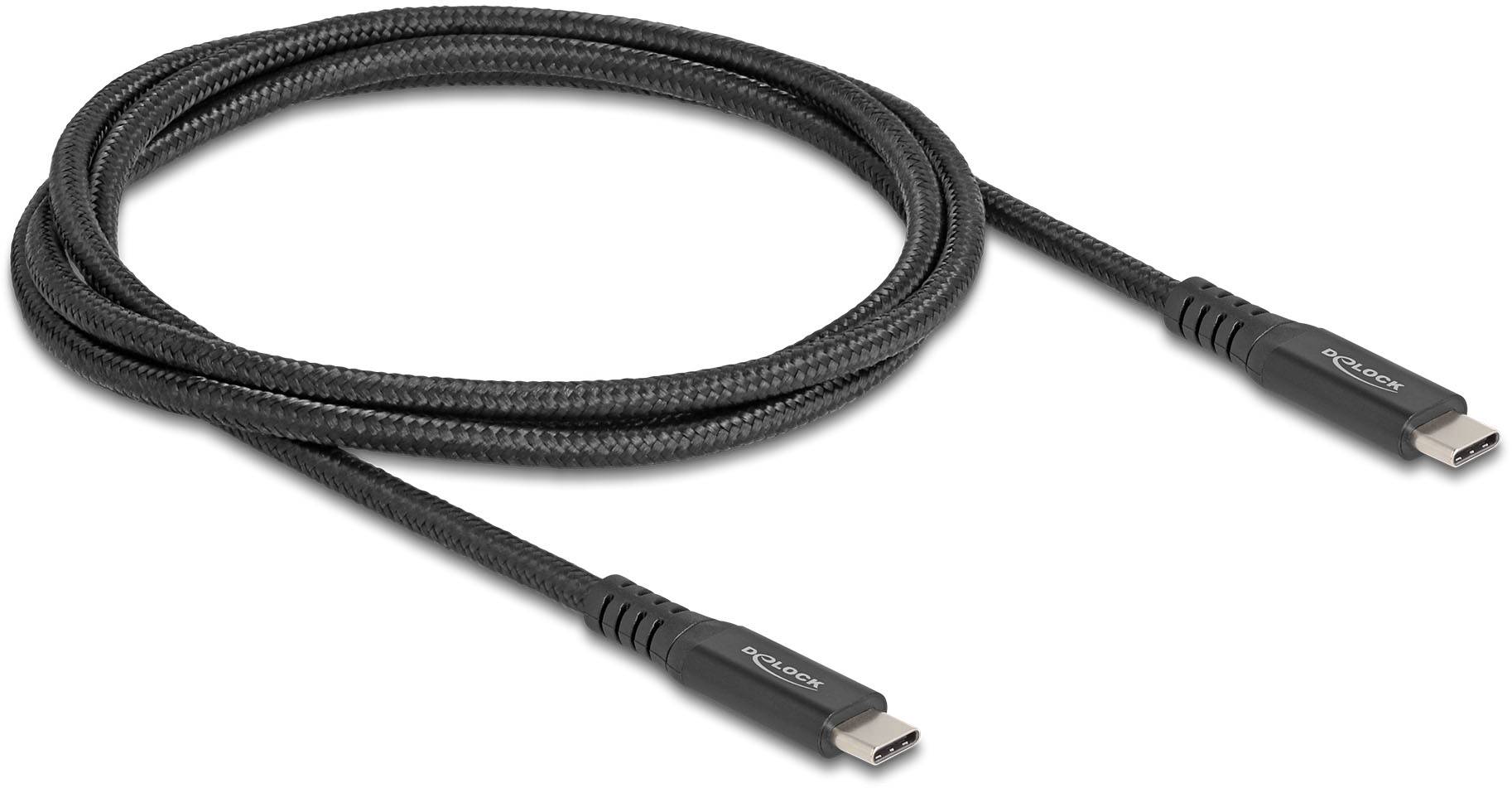 Czarny, pleciony kabel USB-C z dwoma wtyczkami leży w pętli na neutralnym tle.