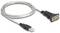 Srebrny kabel USB do Serial z gniazdem USB po lewej stronie i gniazdem szeregowym po prawej stronie, używany do transmisji danych.