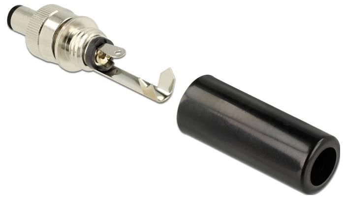 Gniazdo BNC z przewodem lutowanym i czarną zaślepką przedstawia element elektryczny służący do łączenia kabli koncentrycznych.
