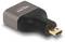 Adapter z pozłacanym złączem HDMI w kształcie prostokąta, z nazwą marki 'Delock' na górnej powierzchni.