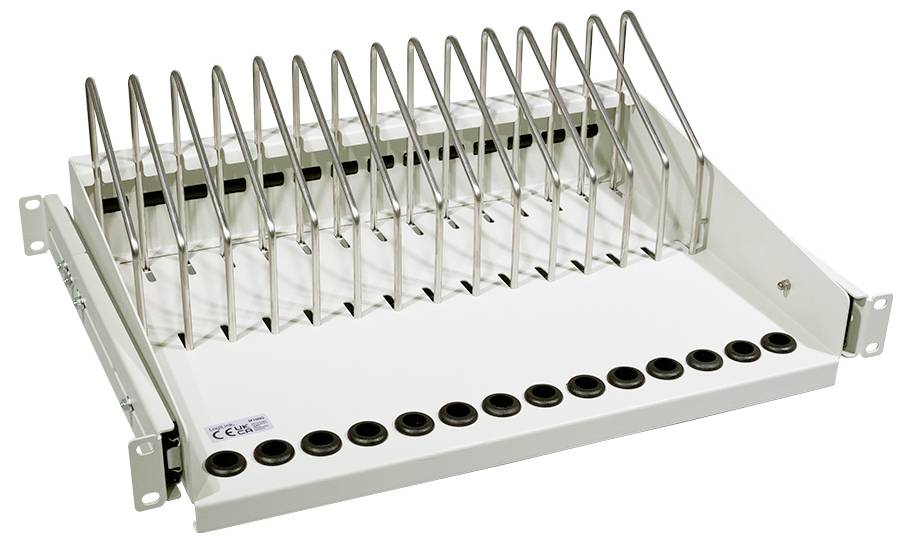 Metalowa rama z uchwytami do kabli i rur, zamontowana na prostokątnej platformie z wieloma otworami do przeprowadzania przewodów.