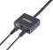 Czarny adapter HDMI do połączenia sieciowego z dwoma podłączonymi kablami, jeden do sieci, drugi do HDMI, marka 'speaka PROFESSIONAL'.