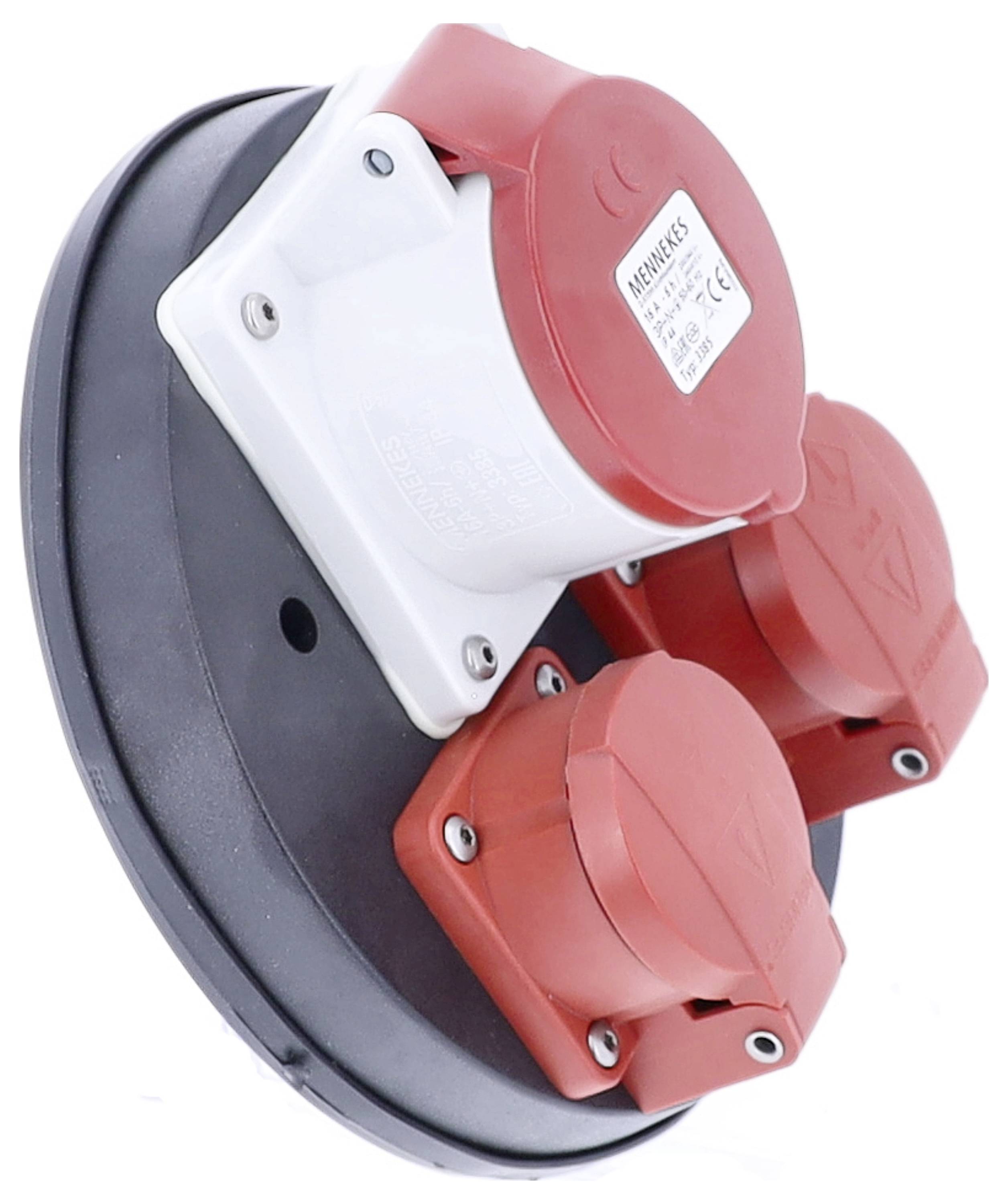 Okrągła, czarna obudowa z trzema czerwonymi, przemysłowymi gniazdami elektrycznymi, odpowiednia do zastosowań wysokowydajnościowych.