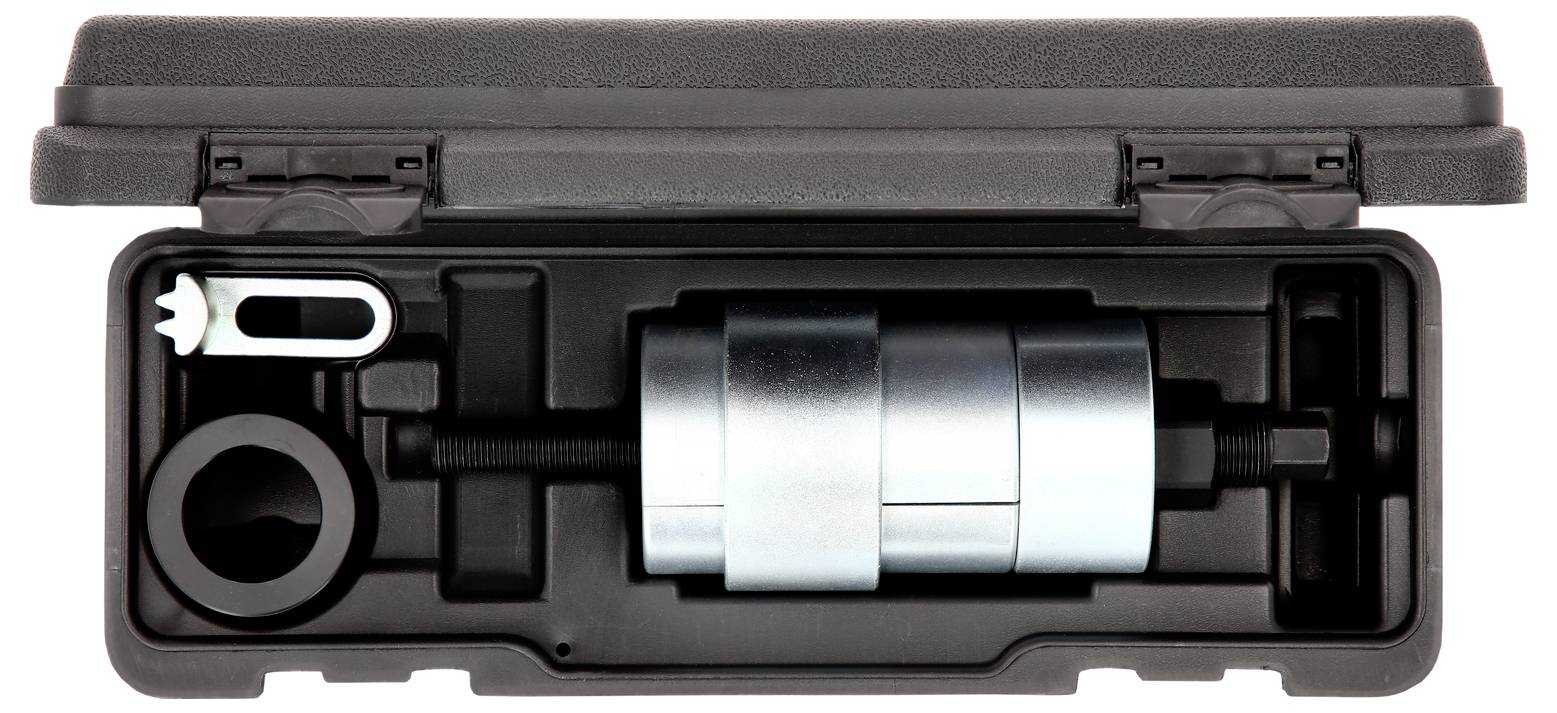 Zestaw narzędzi w otwartej czarnej plastikowej walizce, zawierający metalowe narzędzie wielofunkcyjne oraz elementy wyposażenia do konserwacji lub naprawy.