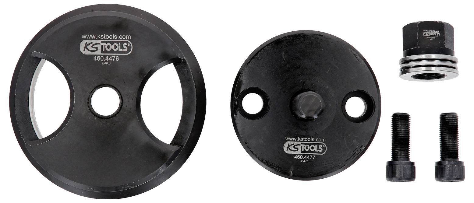 Zestaw narzędzi do montażu i demontażu, składający się z trzech elementów: dwóch czarnych krążków i jednej czarnej pary śrub.