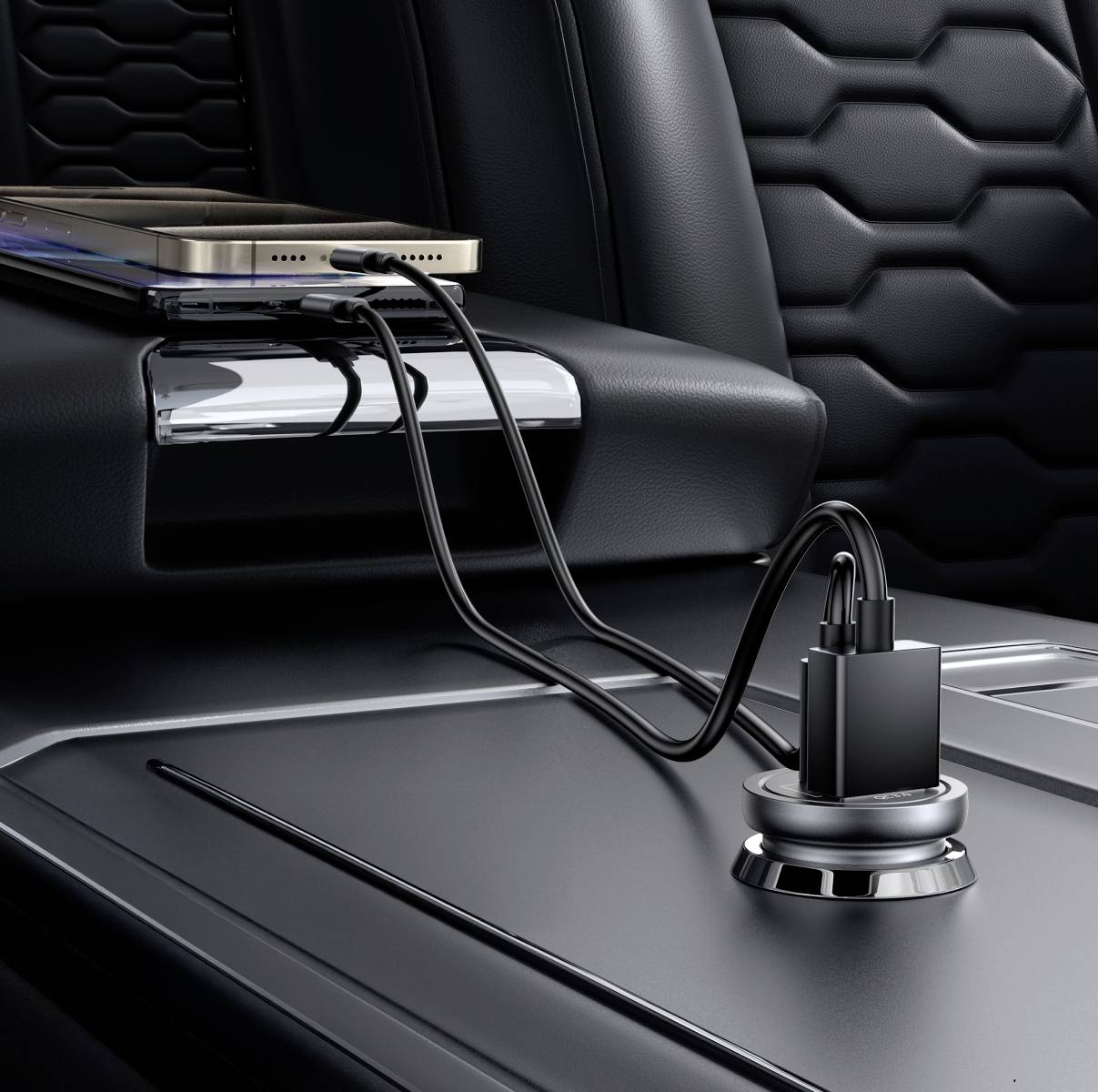 Smartfon jest ładowany w samochodzie za pomocą ładowarki przez dwa przewody. Ładowarka znajduje się w konsoli środkowej.