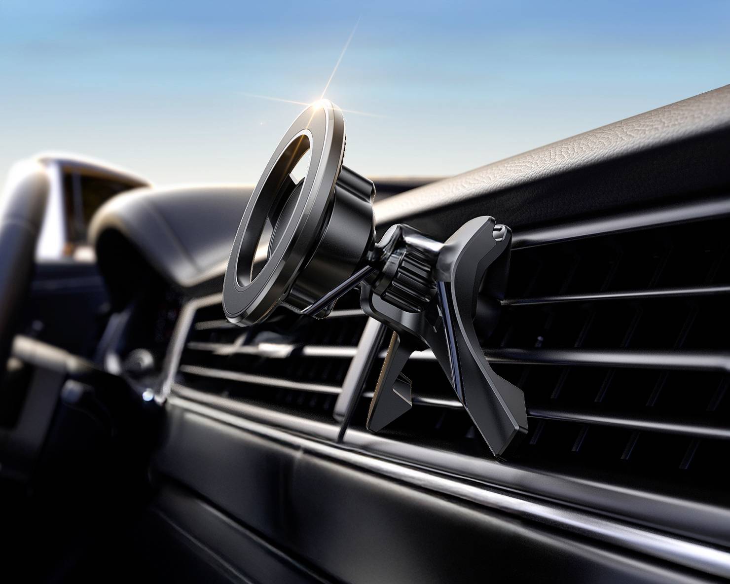 Uchwyt smartfona zamontowany na wylocie nawiewu w samochodzie, błyszczący metal, wnętrze samochodu, błękitne niebo w tle.