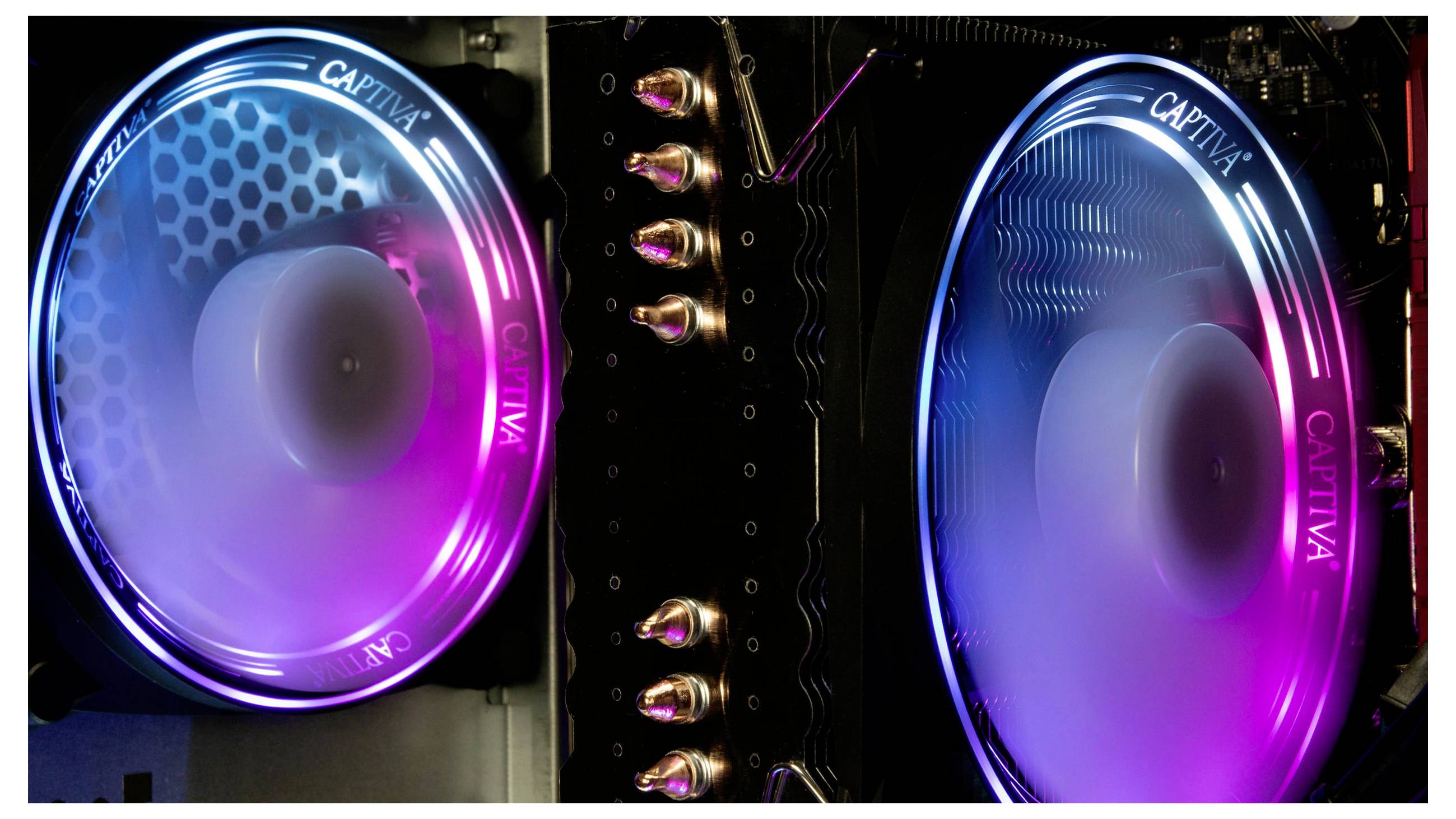 Dwa podświetlane wentylatory komputerowe w kolorach neonowego niebieskiego i różowego, zamontowane w obudowie z przezroczystym oknem.