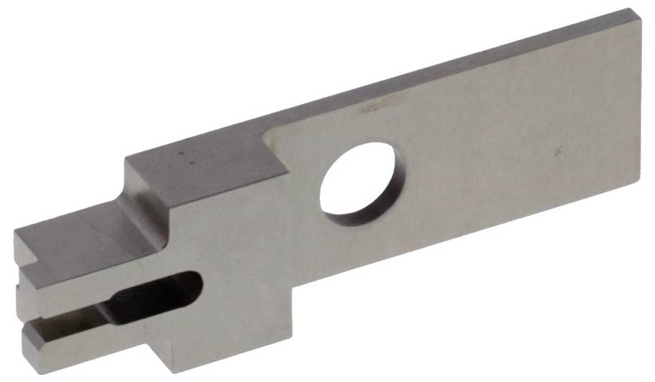 Metalowy element zastępczy o prostokątnym kształcie z centralnym otworem; prawdopodobnie nadający się do zastosowań mechanicznych lub przemysłowych.