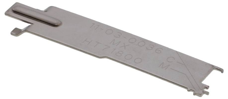 Część metalowa z grawerunkiem '11-03-0036 MX HT71800 C M', o prostokątnym kształcie, przeznaczenie nieznane.