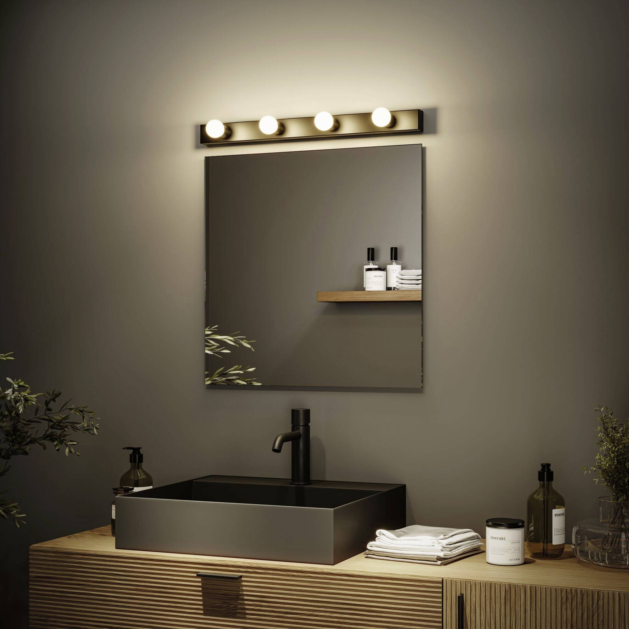 Nowoczesna łazienka z prostokątnym lustrem, czarną umywalką, drewnianą komodą i oświetleniem nad nią. Ozdobne rośliny i ręczniki.