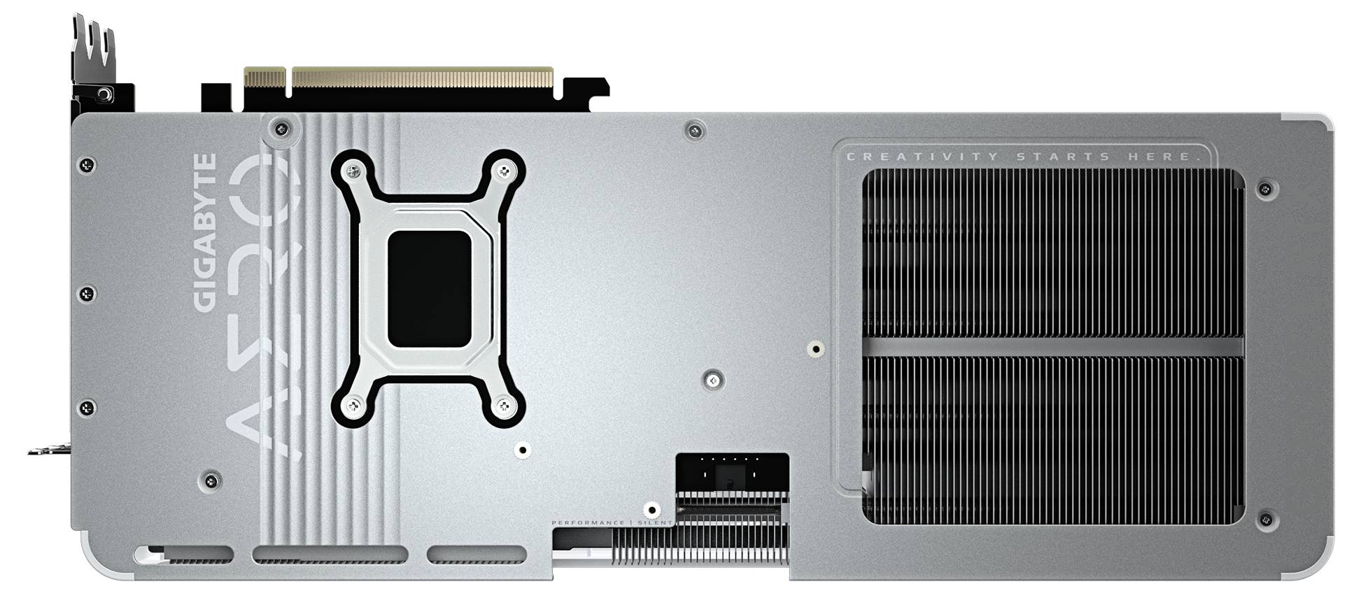 Tylna strona karty graficznej marki Gigabyte. Widoczny jest radiator z otworami wentylacyjnymi oraz złącza. Tekst na karcie: 'AERO'.