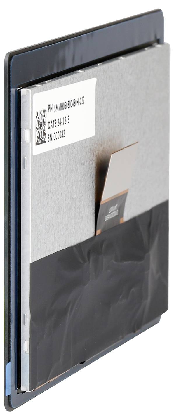 Elektroniczne urządzenie z prostokątną metalową obudową i widocznym złączem kablowym na górnej powierzchni.