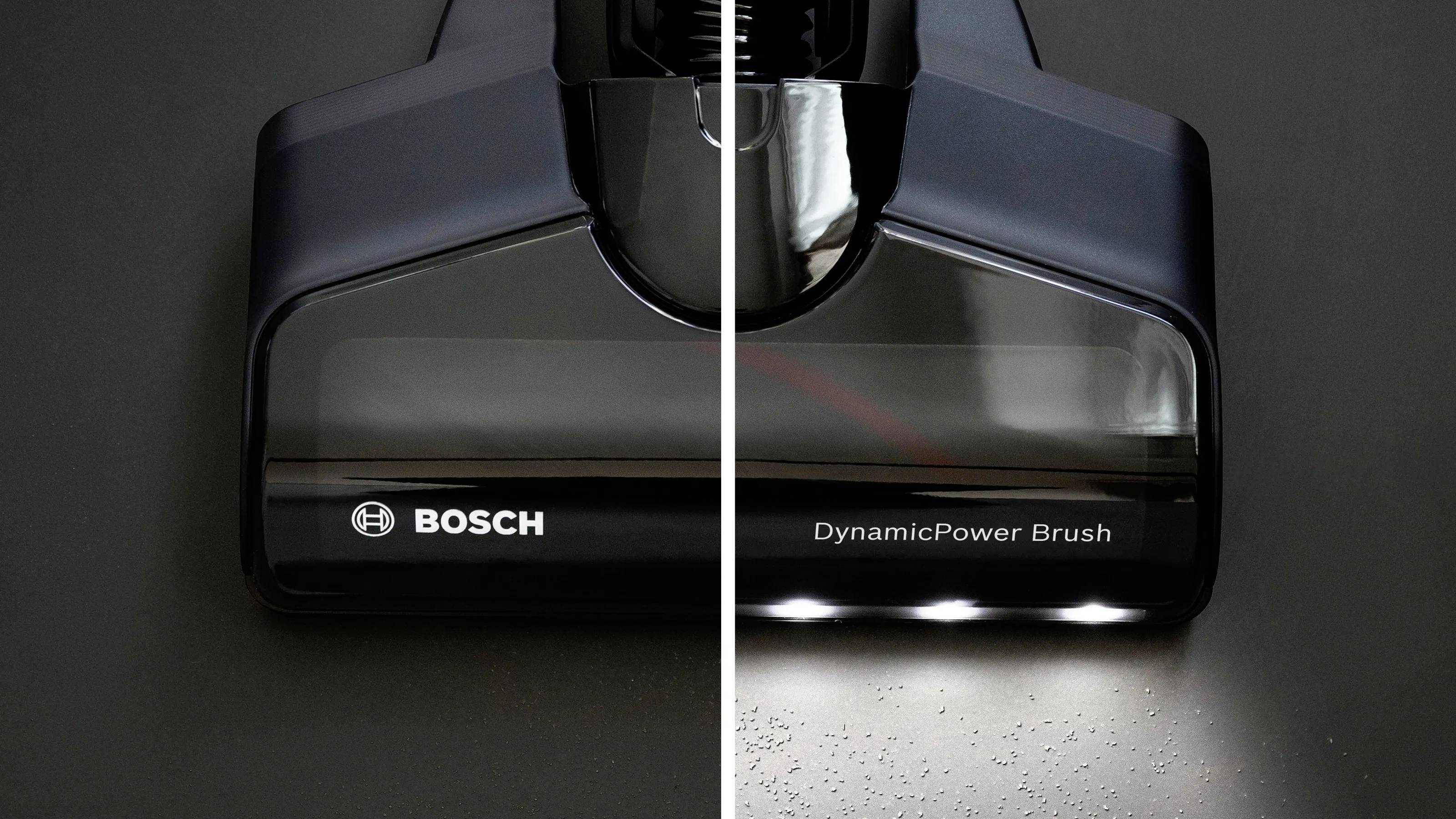 Końcówka odkurzacza z diodą LED, marka Bosch, czyści połowę powierzchni; po lewej stronie brudno, po prawej czysto. Tekst na końcówce: 'DynamicPower Brush'.