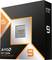 Czarna opakowanie procesora 'AMD Ryzen 9 9000 Series' z pomarańczowymi akcentami i informacją o 'technologii AMD 3D V-Cache'.