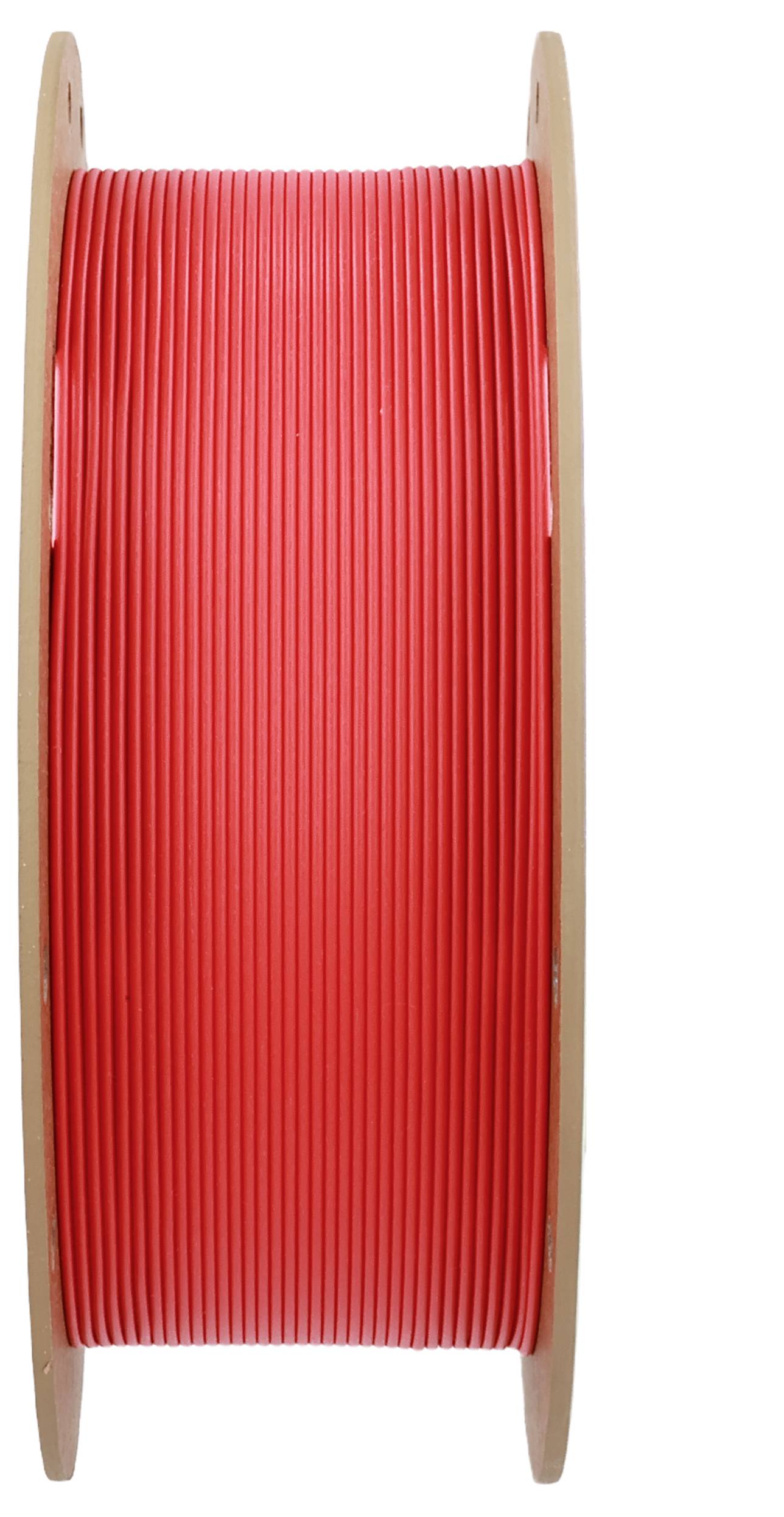 Szpula z czerwonym filamentem do drukarki 3D, stojąca pionowo.