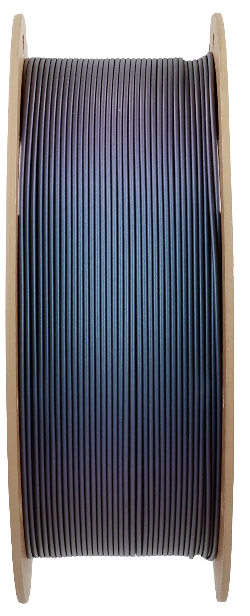 Szpula z ciemnym filamentem do drukarki 3D.