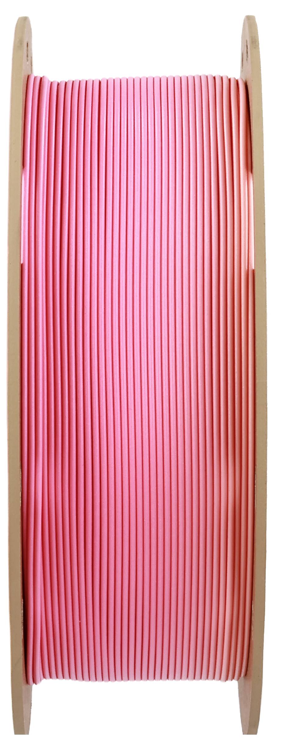 Rolka z różowym drutem z tworzywa sztucznego, ustawiona pionowo. Prawdopodobnie nadaje się do użytku w drukarkach 3D.