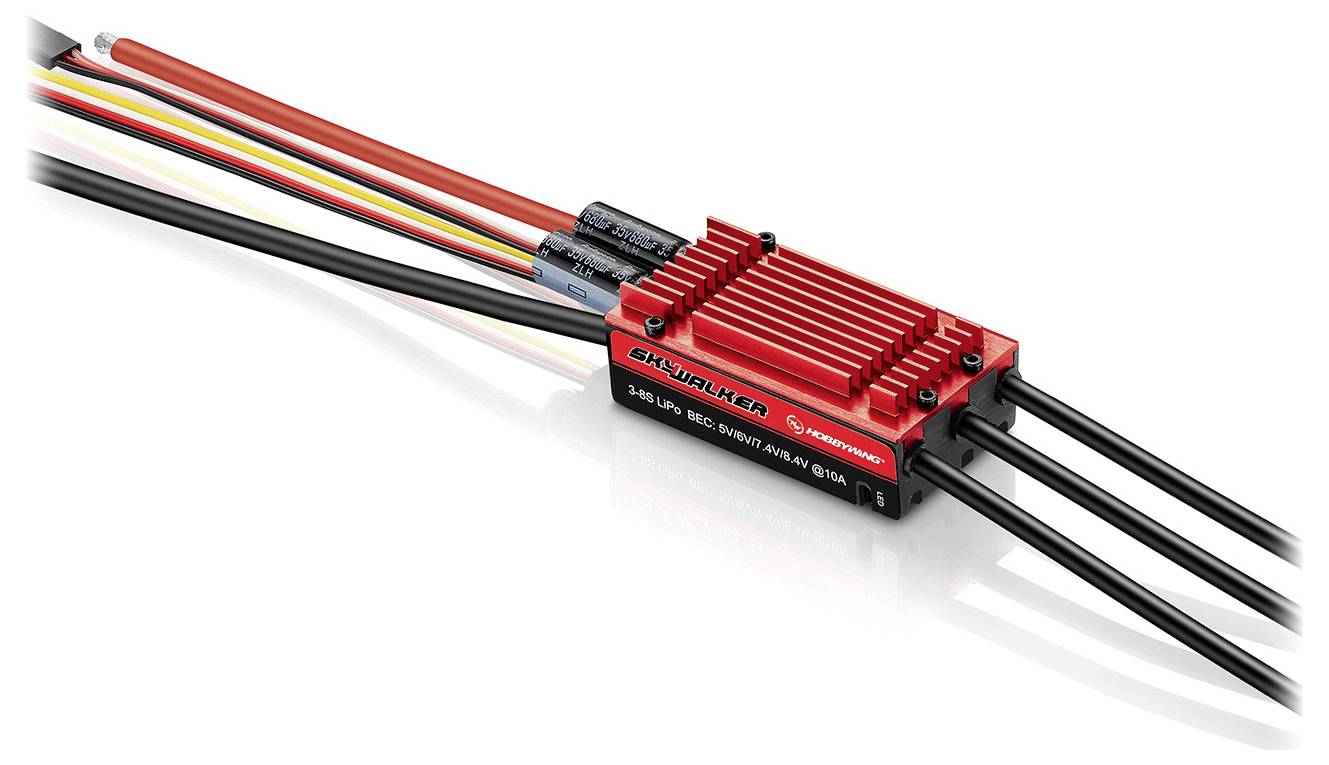 Elektroniczny regulator prędkości w kolorze czerwonym z żeberkami chłodzącymi, wyposażony w kilka połączonych przewodów, przeznaczony do modeli zdalnie sterowanych.