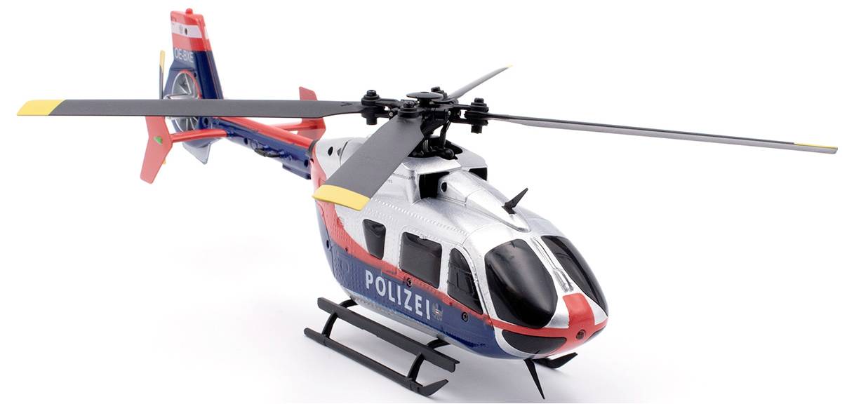 Zabawkowy helikopter w kolorach policyjnych z napisem 'Policja'. Helikopter posiada niebieskie, białe i czerwone detale.
