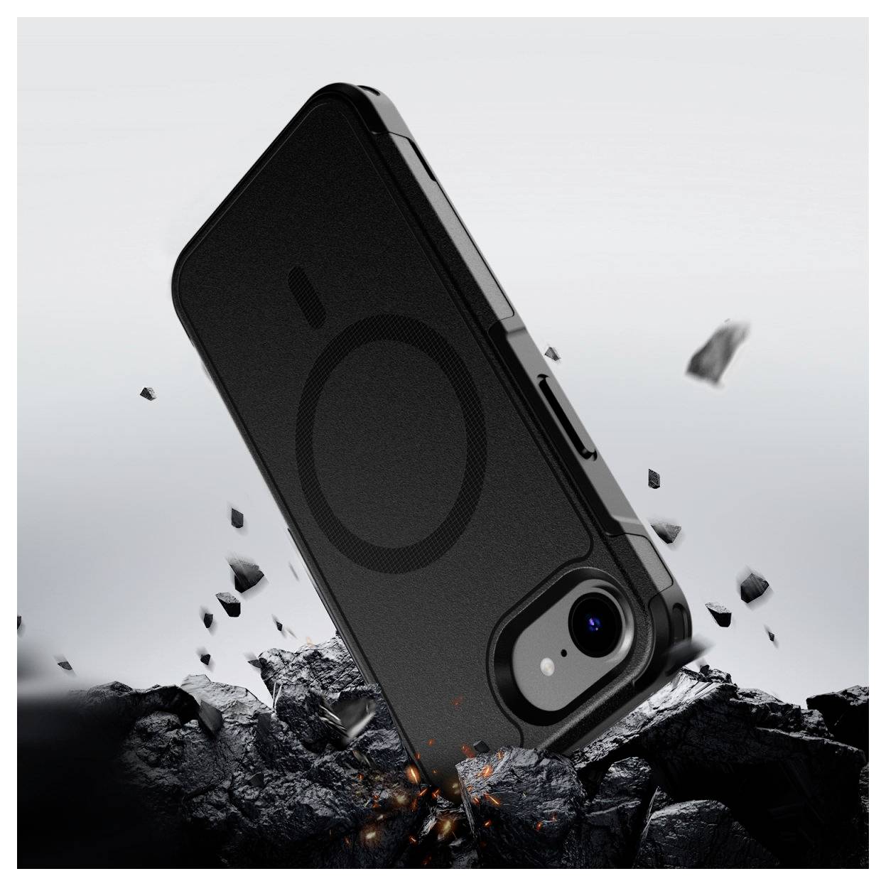 Solidny smartfon leży ukośnie na kruszy kamiennej powierzchni, symbolizując ochronę i wytrzymałość.