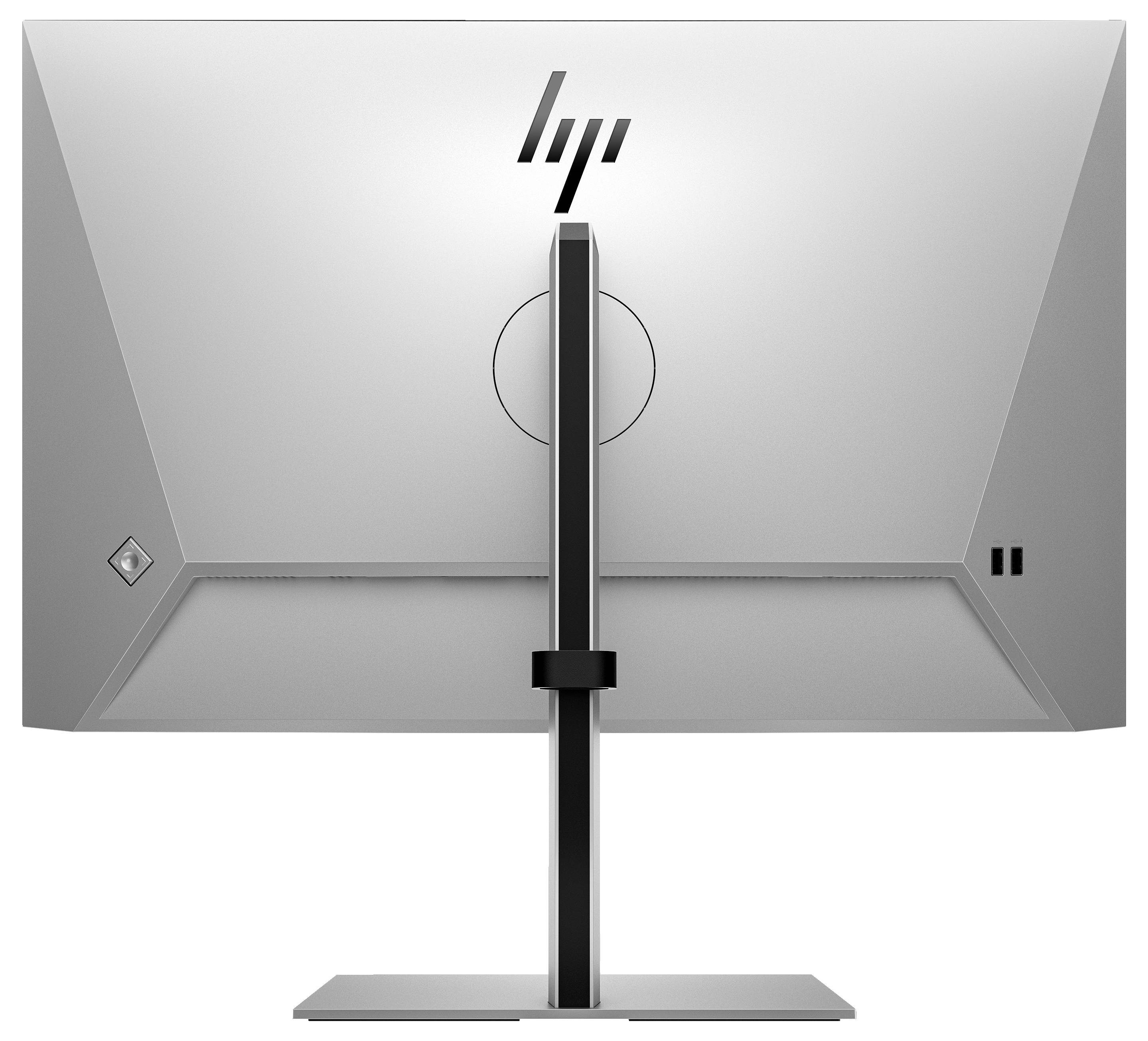 Srebrny monitor komputerowy widziany od tyłu, z prostą podstawą. Na górze, pośrodku, widoczne logo marki.