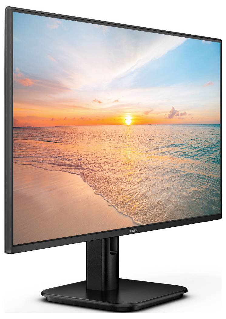 Monitor z obrazem zachodu słońca nad morzem, malującym niebo w odcieniach pomarańczowego i niebieskiego.