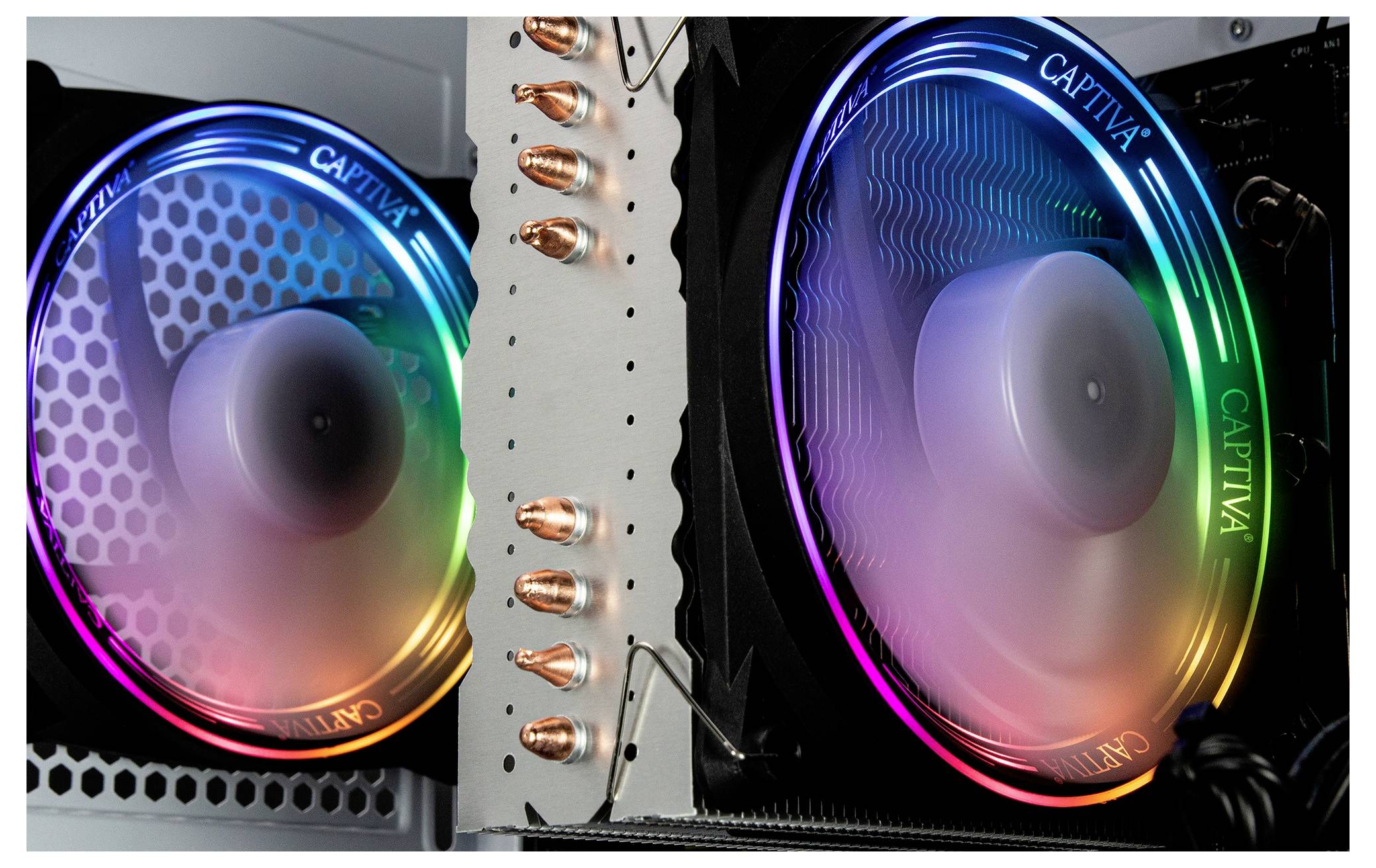 Dwa wentylatory komputerowe z kolorowymi pierścieniami LED wewnątrz obudowy komputera. Wyświetlają efekt tęczowy i są zamontowane na radiatorach.