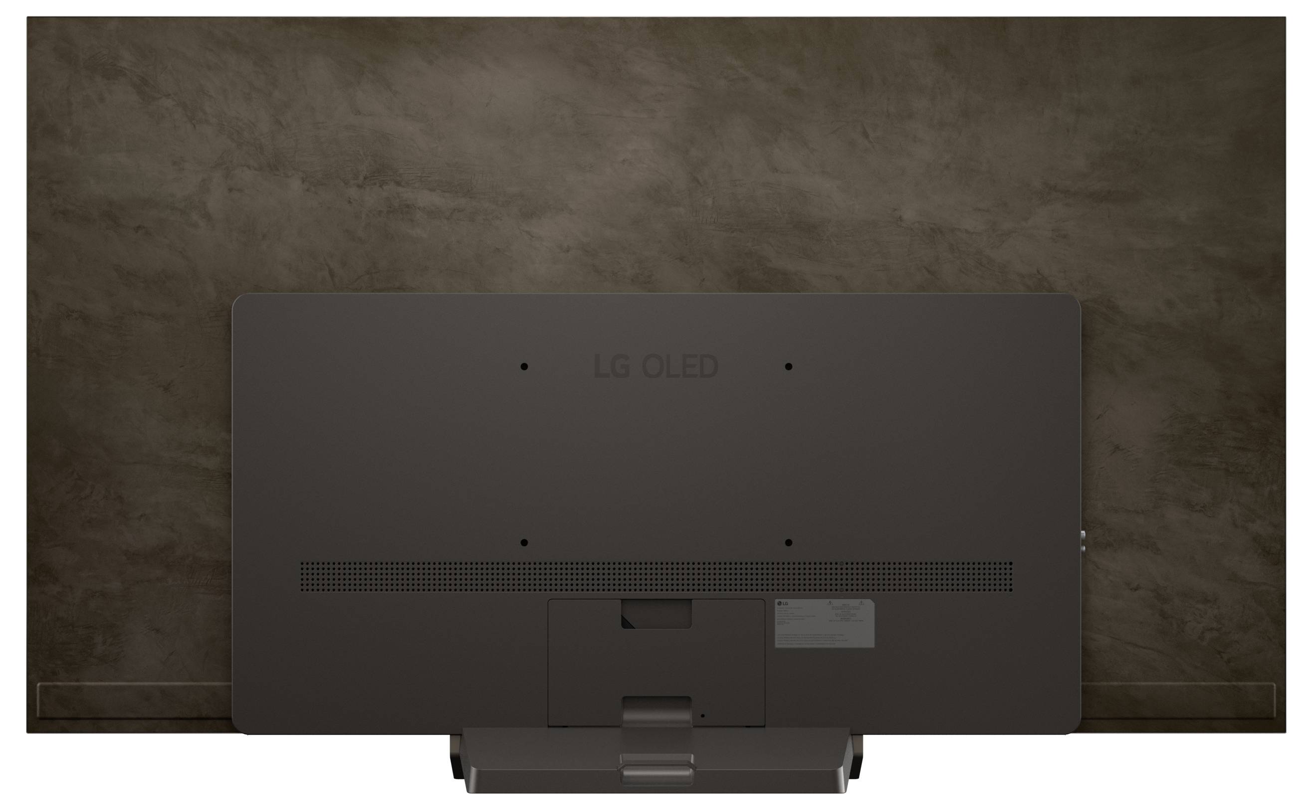 Widok z tyłu telewizora LG OLED zamontowanego na brązowej, teksturowanej ścianie, podkreślający smukły panel i minimalistyczny design.