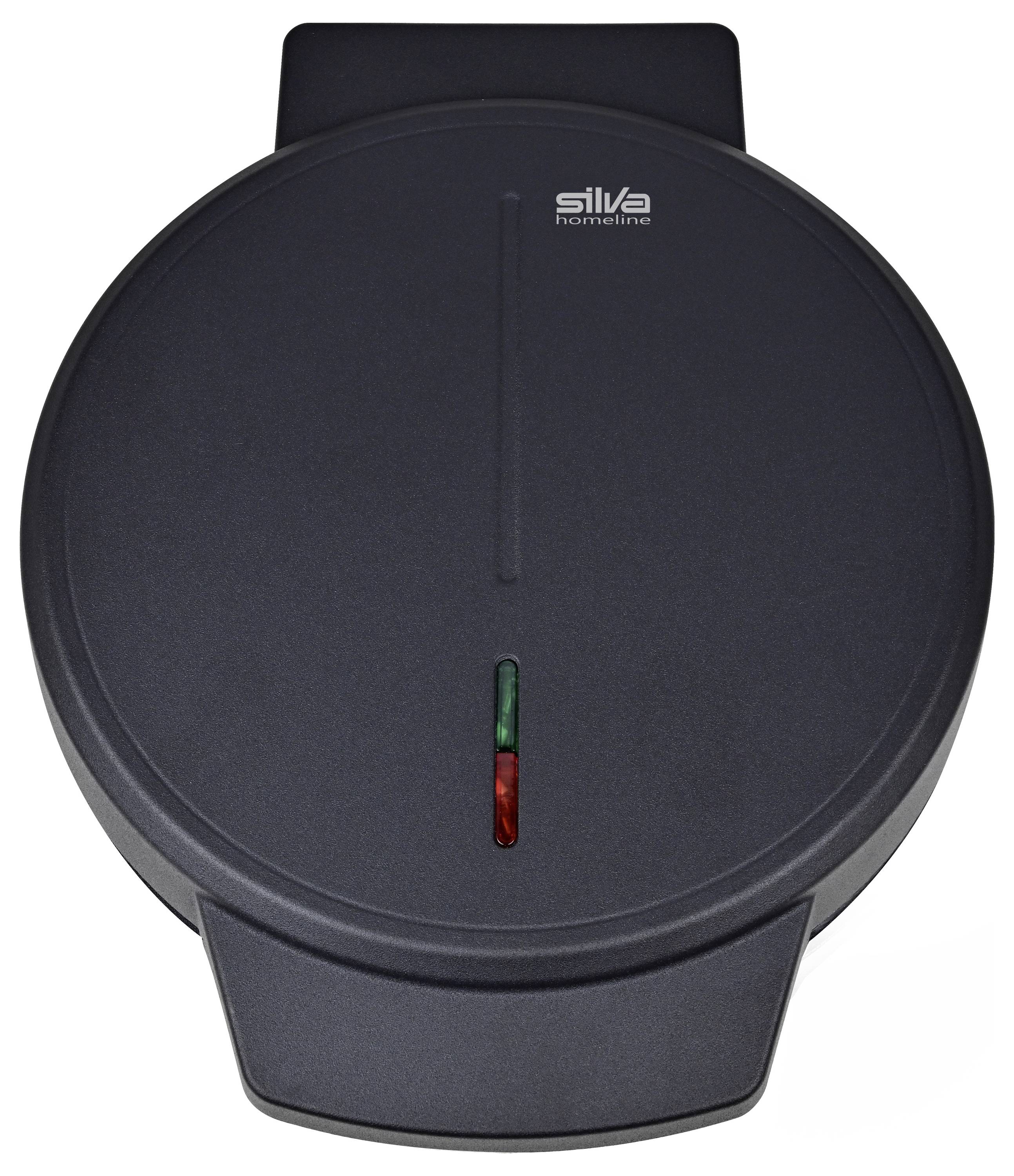 Okrągła, czarna gofrownica z małą zieloną i czerwoną lampką na górnej powierzchni wskazuje stan pracy urządzenia.