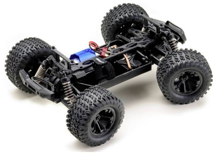 Podwozie zdalnie sterowanego samochodu z dużymi oponami terenowymi, odsłoniętym obwodem elektronicznym i sprężynami zawieszenia, zaprojektowane do precyzyjnej nawigacji w trudnym terenie.