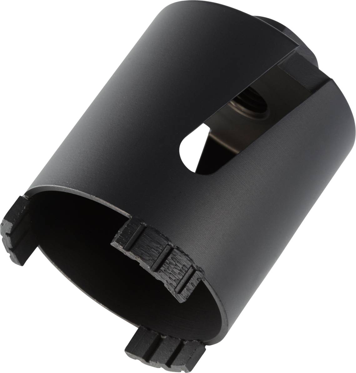 Metalowa piła otwornica z uzębionym brzegiem, używana do wycinania dużych otworów w materiałach takich jak drewno lub metal.