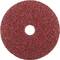 Czerwona tarcza szlifierska o szorstkiej teksturze i okrągłym kształcie, stosowana do obróbki powierzchni przy użyciu szlifierek kątowych.